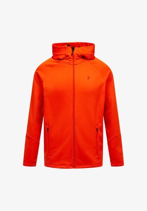 Rød zip-up jakke lavet af blødt stof. Har en høj krave, to sidelommer og et logo på venstre brystområde.