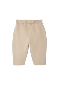 Beige Kindershorts aus weichem Baumwollstoff, mit einem elastischen Bund und einem einfachen, lockeren Schnitt.