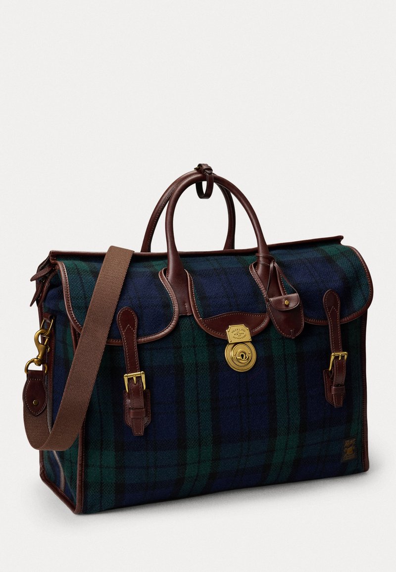 Wool bag in dark green and navy plaid, brown leather accents, rounded top, dual handles, detachable strap, and gold-tone fastening details.