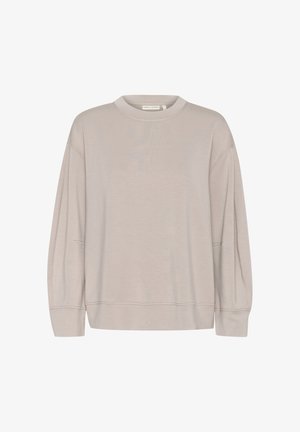 Világosszürke pamut pulóver kerek nyakkivágással, hosszú ujjakkal és laza fazonnal. A hemnél és az ujjaknál varrási részletekkel rendelkezik.