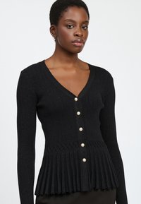 INFLUENCER Strickjacke - black