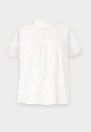 Bluză albă cu mânecă scurtă, cu decolteu pliant, textură subtilă și croială lejeră. Închiderea din spate prezintă un detaliu cu buclă și nasture.