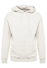 Jasnobeżowa bluza z kapturem wykonana z miękkiej bawełnianej mieszanki, z kieszenią kangurka, kapturem ze sznurkiem, ściągaczami na rękawach i u dołu.