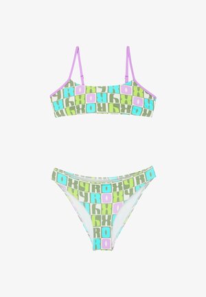 Bikini deux pièces avec motifs géométriques multicolores en vert, bleu et violet, affichant le texte "ROXY" et des bretelles fines lilas.