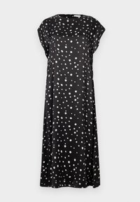 Schwarzes Kleid aus weichem Stoff mit lockerem Schnitt, kurzen Ärmeln und einem durchgehenden weißen Polka-Dot-Muster. Rundhalsausschnitt.