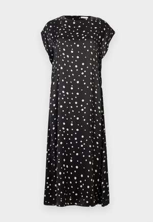 Schwarzes Kleid aus weichem Stoff mit lockerem Schnitt, kurzen Ärmeln und einem durchgehenden weißen Polka-Dot-Muster. Rundhalsausschnitt.