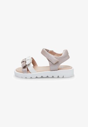 Leather sandal featuring a white and metallic rose strap design, adjustable ankle strap, and textured white sole with a wavy pattern.
