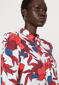 Expresso Blusa com botões - red