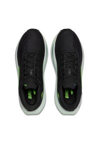 Melnas skriešanas kurpes ar elpojošu sietu augšdaļu, zaļiem akcentiem un mīkstu zoli. Iespējams, ir saistāma dizaina un teksturēta virsma.