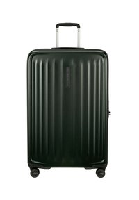 Hard-shell suitcase in dark green, featuring vertical ribbed texture, a telescopic handle, and four black wheels.