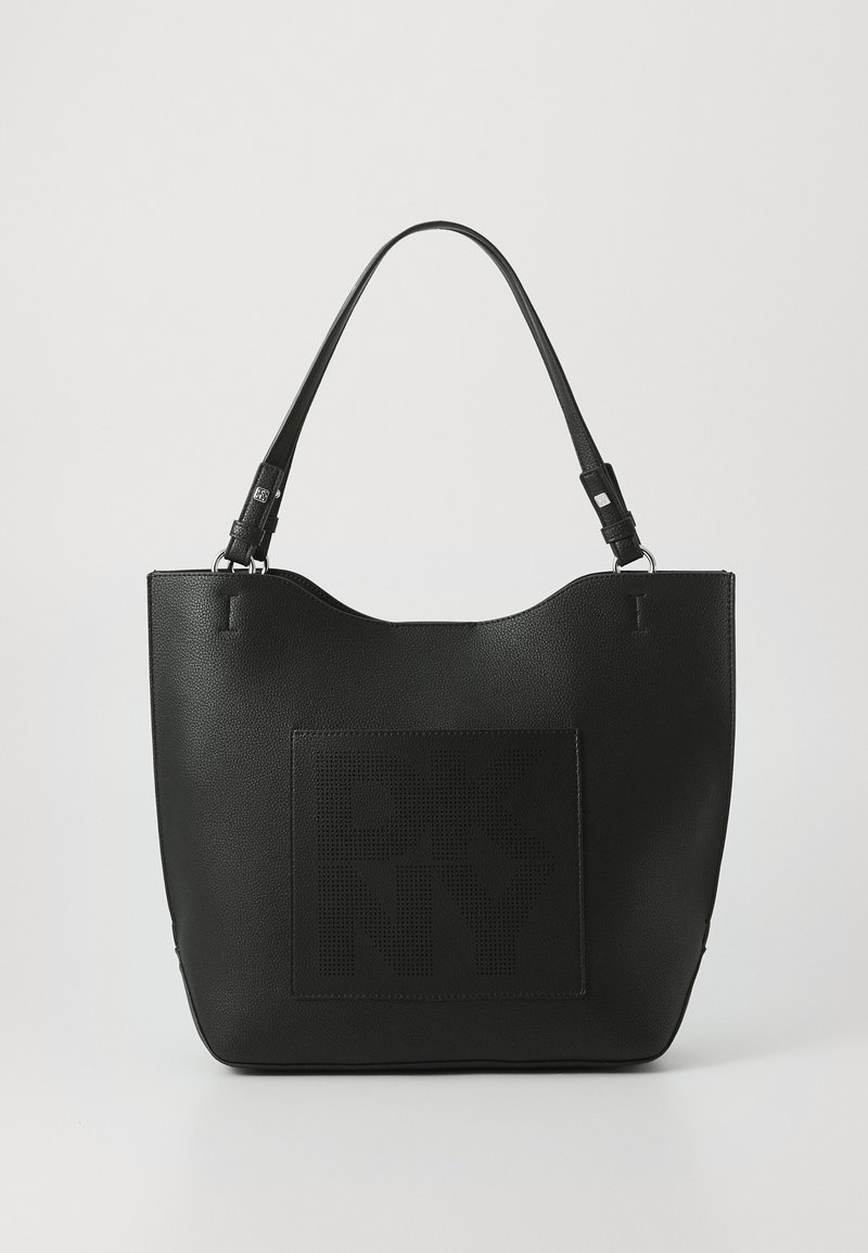 Black leather tote bag with a textured surface, featuring a perforated DKNY logo in the center and two shoulder straps for carrying.