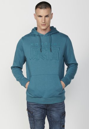 Pulover s kapuco - menta