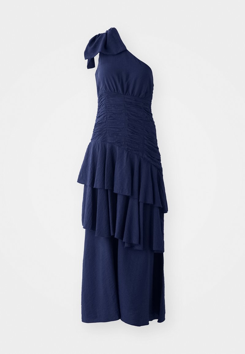 Navy blue dress with one shoulder strap, gathered bodice, and multiple layered ruffles at the hem, made from textured fabric.