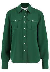 Camicia verde con bottoni realizzata in tessuto liscio, con colletto, due tasche sul petto e piping bianco lungo i bordi delle tasche e della patta dei bottoni.
