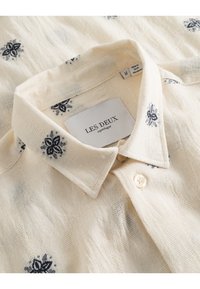 Les Deux IRA - Srajca - ivory/blue