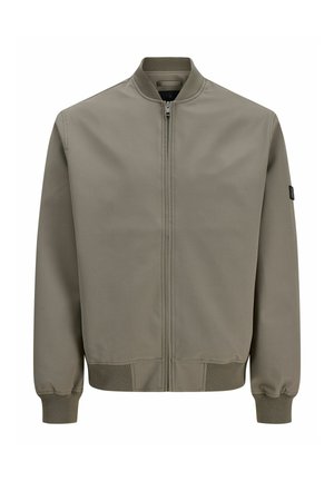 Veste bomber vert kaki avec fermeture éclair à l'avant, col, poignets et ourlet côtelés, et un petit écusson sur la manche gauche.