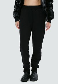INFLUENCER LOGO EMBROIDERED - Jogginghose - black