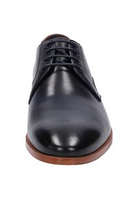 Chaussure habillée en cuir noir avec une finition lisse, un bout arrondi et un laçage. Elle dispose d'une semelle en cuir marron et de subtils accents de couture.