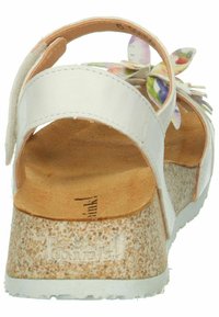 Weißes Leder-Flip-Flop mit floralen Akzenten, Korkfußbett und einer strukturierten Plattformsohle. Verstellbarer Riemen an der Ferse für einen sicheren Sitz.