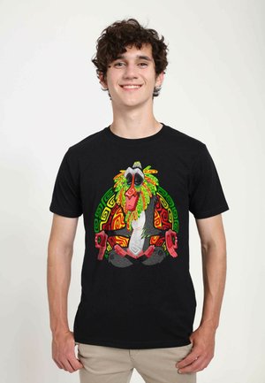 Black T-shirt featuring a colorful graphic of a monkey with a vibrant mane, surrounded by intricate green and red patterns.