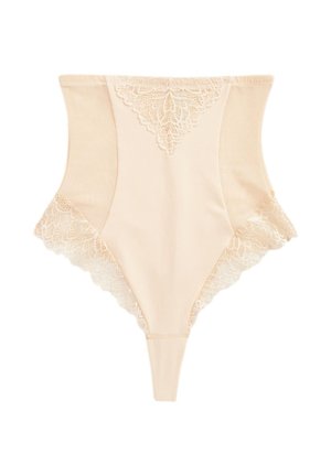 Magas derekú bézs tanga csipkés szegéllyel a felső középen és a lábnyílásoknál, sima és rugalmas anyagból készült.