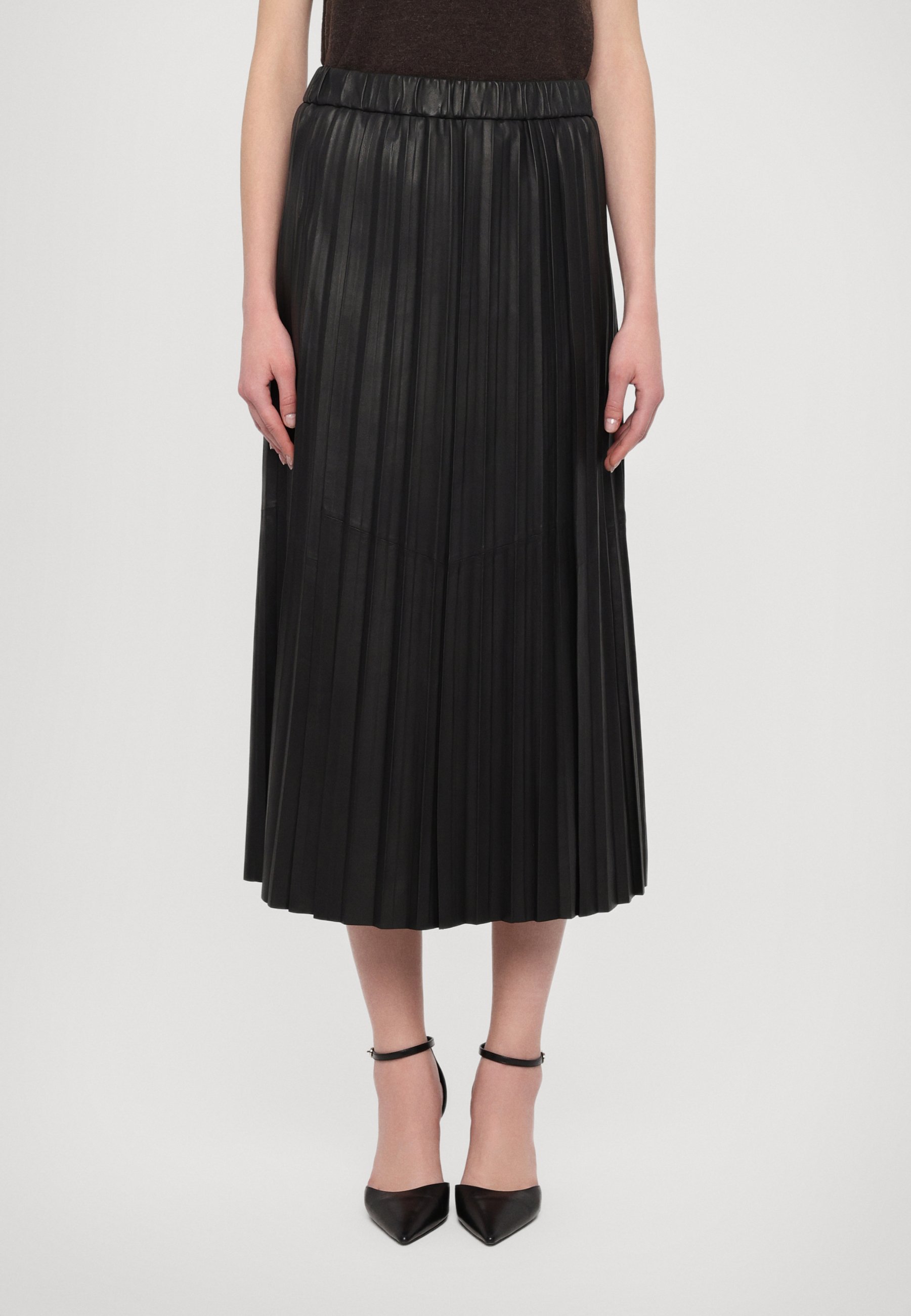Jupe plissée en cuir PU noir pour femmes, nouvelle collection, taille haute, à la mode, assortie avec tout, jupe mi-longue trapèze