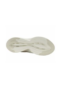 Suola di una scarpa sportiva beige con motivi di battistrada ondulati e sezioni di grip alla parte del tallone e delle punte.