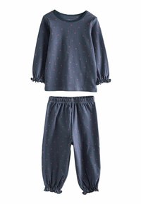 Dark blue cotton pajama set with long-sleeve top and pants. Top has pink polka dots and gathered cuffs; pants feature an elastic waistband.