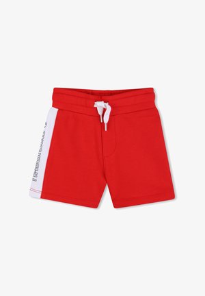 Red children's shorts with white side panel and drawstring waist, featuring Timberland branding on the side panel.