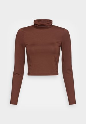 Brun, langærmet, cropped turtleneck top lavet af strækbart stof; glat tekstur med en høj, foldet krave.