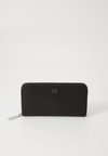 RE-LOCK LARGE ZIP AROUND - Wallet - black