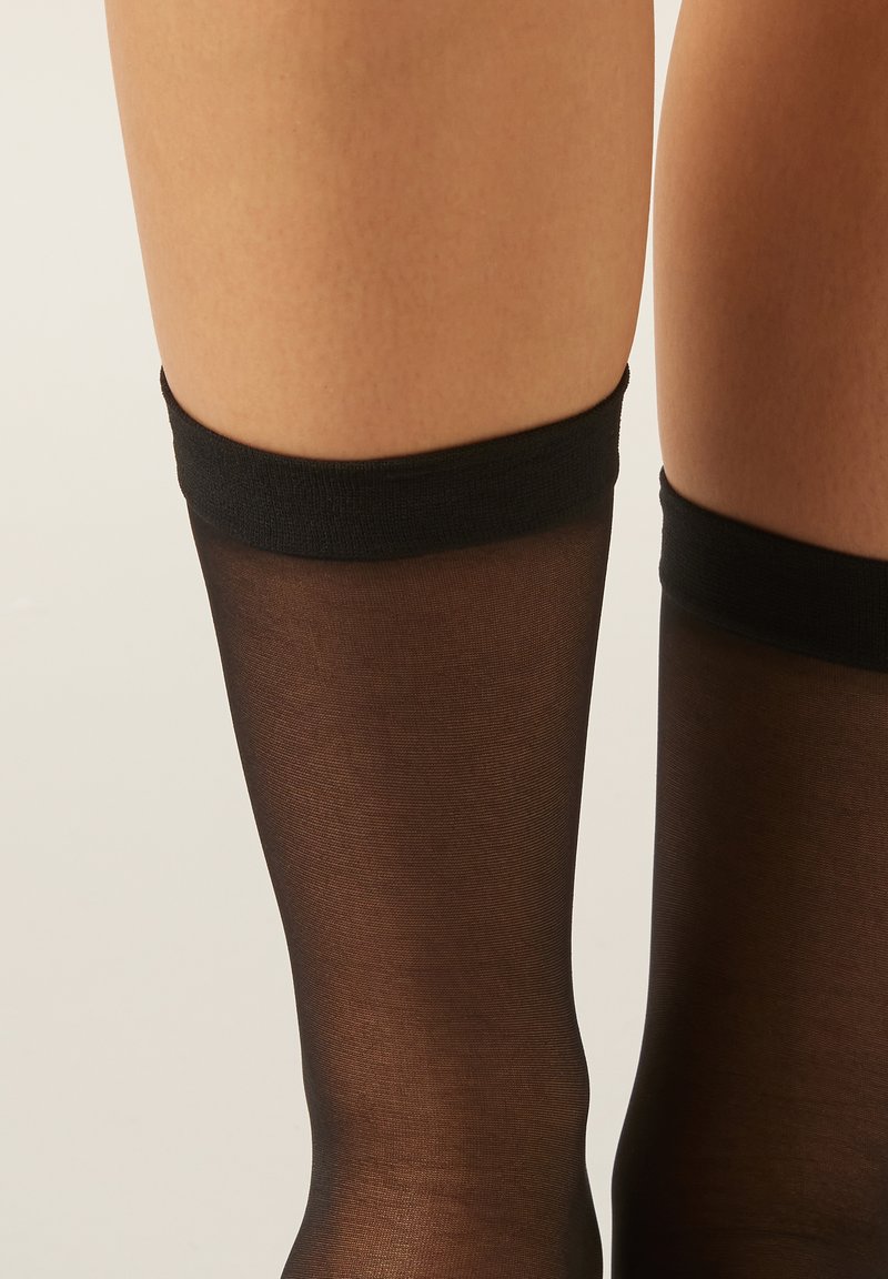 Confezione Da 10 Paia Di Calze Trasparenti Da Donna No Nonsense Alte Fino Al Ginocchio Con Parte Superiore Comoda Nera Confezione Regolare~p116096536