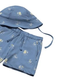 Conjunto de sombrero de cubo y pantalones cortos de algodón azul con un patrón náutico, que presenta barcos y animales. Cordón ajustable y cintura elástica.