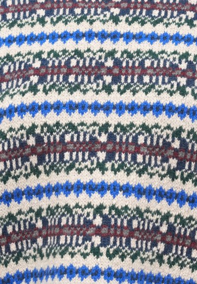 Fair isle knit pattern with horizontal rows of white, blue, green, burgundy, and navy geometric shapes on wool fabric.