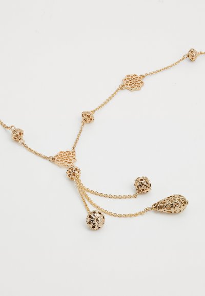 Gold-tone necklace with intricate filigree designs, featuring various shapes including floral, ball, and teardrop accents along a chain.