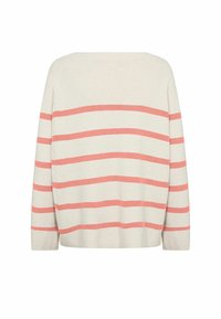 Cream sweater with horizontal coral stripes, loose fit, wide neckline, and ribbed texture. Long sleeves extend to the wrist.