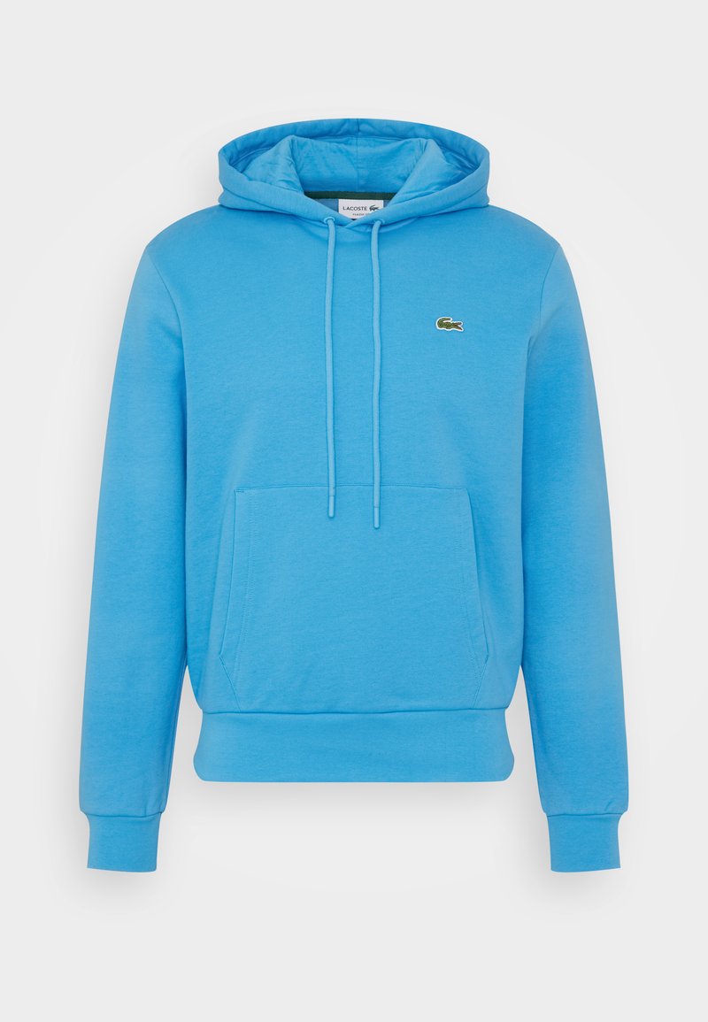 Sweat à capuche bleu en mélange de coton doux, avec une poche frontale, des poignets côtelés et un petit logo sur la poitrine.