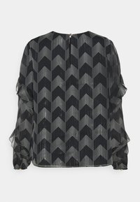 Schwarze Bluse mit einem strukturierten Zickzackmuster in Weiß. Sie hat lange Ärmel mit Rüschenkanten und einen Rückenschluss mit Schlüsselloch.