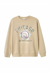 Sudadera beige con el texto "CHICAGO" y un gráfico de béisbol. Material de mezcla de algodón, puños acanalados y cuello redondo.