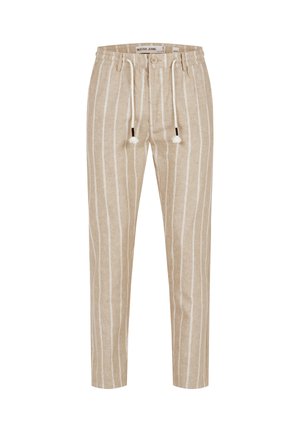 Pantalon en lin beige à rayures verticales blanches, taille élastique avec bouton, et cordons de serrage blancs avec pompons.