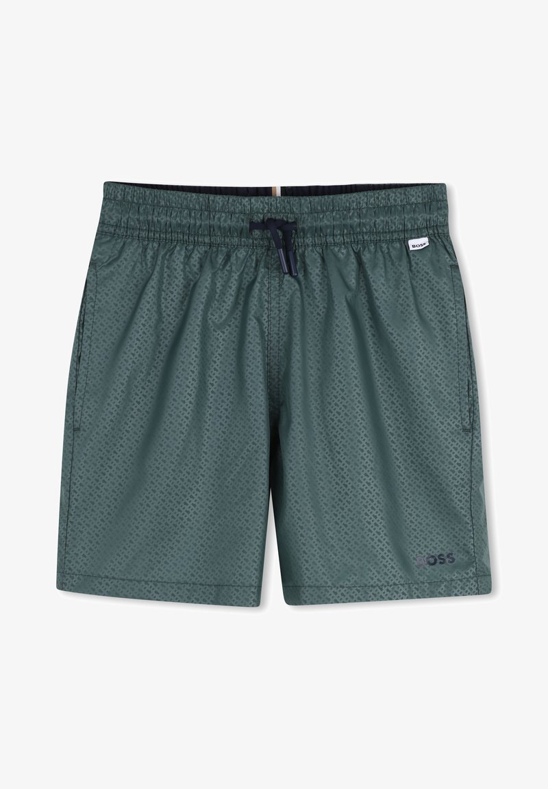 Shorts de bain verts à motifs avec taille élastique, cordon noir, poches latérales et petit logo de marque sur l'ourlet de la jambe gauche.