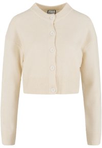 Krátký krémový kardigan z měkké, texturované látky, s žebrovaným lemem a zapínáním na pět velkých knoflíků.