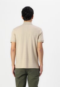 Tommy Hilfiger Polo - sandalwood