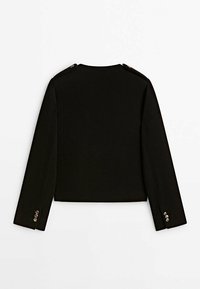 Veste noire longue à manches longues et courte, avec épaulettes à boutons et trois boutons argentés sur chaque poignets, vue de dos.