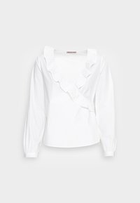 Camicia bianca a maniche lunghe con collo a V e bordo arricciato lungo il collo e la parte frontale. Tessuto di cotone morbido con polsini arricciati sulle maniche.