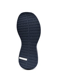 Navy rubber shoe sole featuring a textured pattern of raised triangles and a white Giesswein logo on the side near the heel.