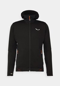 Crna zip-up jakna s teksturiranom tkaninom, s visokim ovratnikom, narančastim detaljima i dva bočna džepa. Ima logo na prsima.