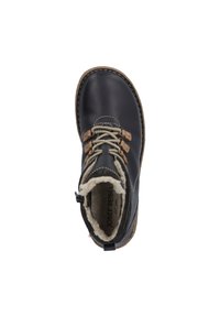 Bottine en cuir noir à bout arrondi, avec doublure en fausse fourrure et accents beige. Présente des lacets gris et une semelle détaillée avec des coutures.