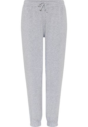 Lys grå joggerbukser lavet af blødt bomuldsblanding. Har en elastisk talje med snøre, tapered ankler og børstet tekstur.