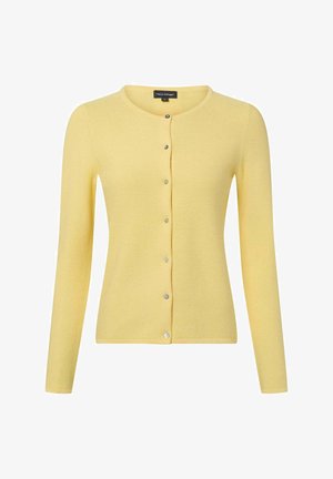 Gele cardigan gemaakt van zacht, geribd stof. Heeft lange mouwen, een ronde hals en zilveren knopen aan de voorkant.